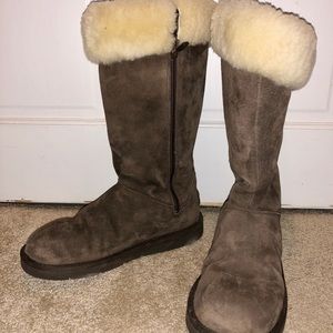 Tall chocolate brown uggs. Barely worn.